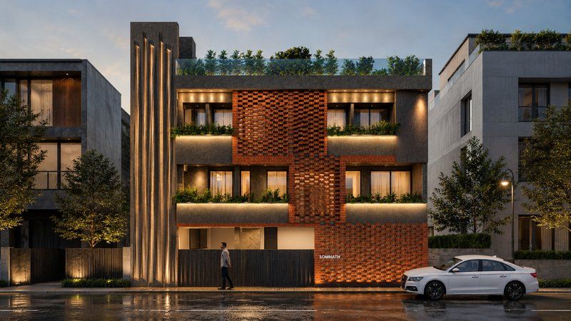 Brick-clad building facade with vertical fins and planted terraces at dusk