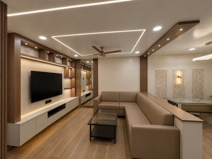 Living room with media wall, concealed storage and cove lighting